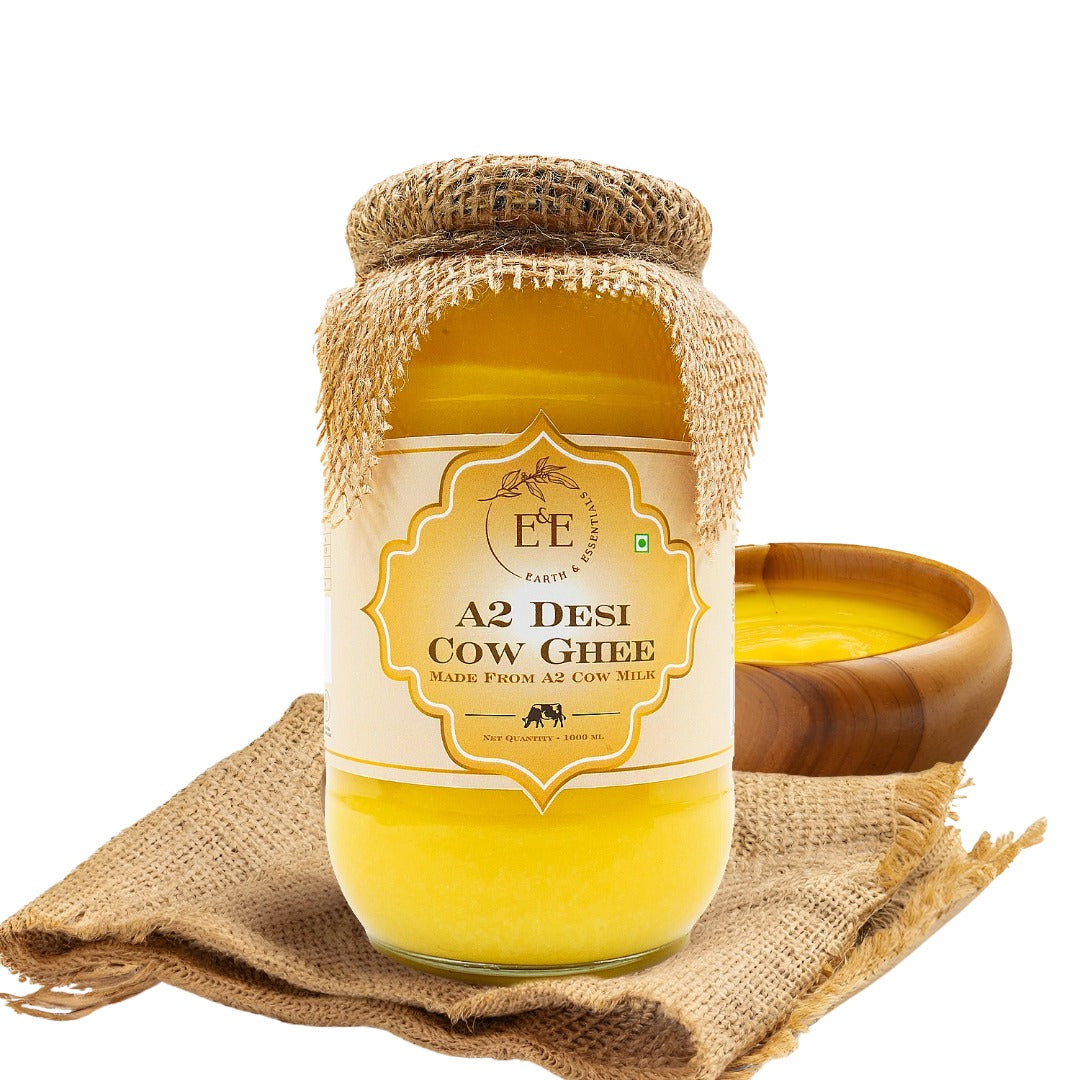 Earth and Essentials A2 Desi Cow Ghee is handcrafted using the traditional Bilona method, ensuring purity, rich aroma, and superior nutrition. Made from grass-fed Sahiwal cow milk, it is free from preservatives, chemicals, and additives.