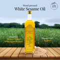 Earth and Essentials Wood-Pressed White Sesame Oil made from 100% high-quality white sesame seeds sourced from Rajasthan, ensuring premium quality and authentic taste
